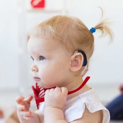 girl with hearing aid