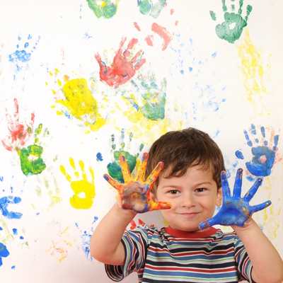 boy with paint on hands